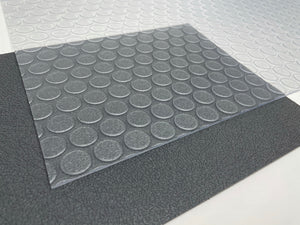 Clear Small Coin texture vinyl printable flooring laid on top of gray-colored vinyl