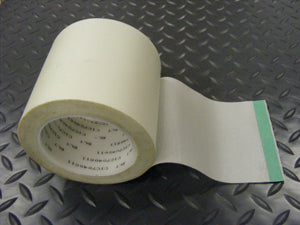 White seam tape on roll sitting on Diamond Tread texture vinyl flooring